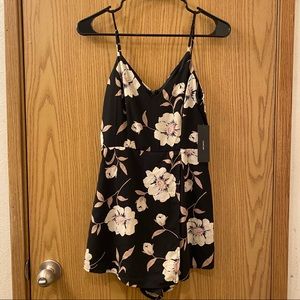 Lulu’s Magical Meadow Black Floral Romper